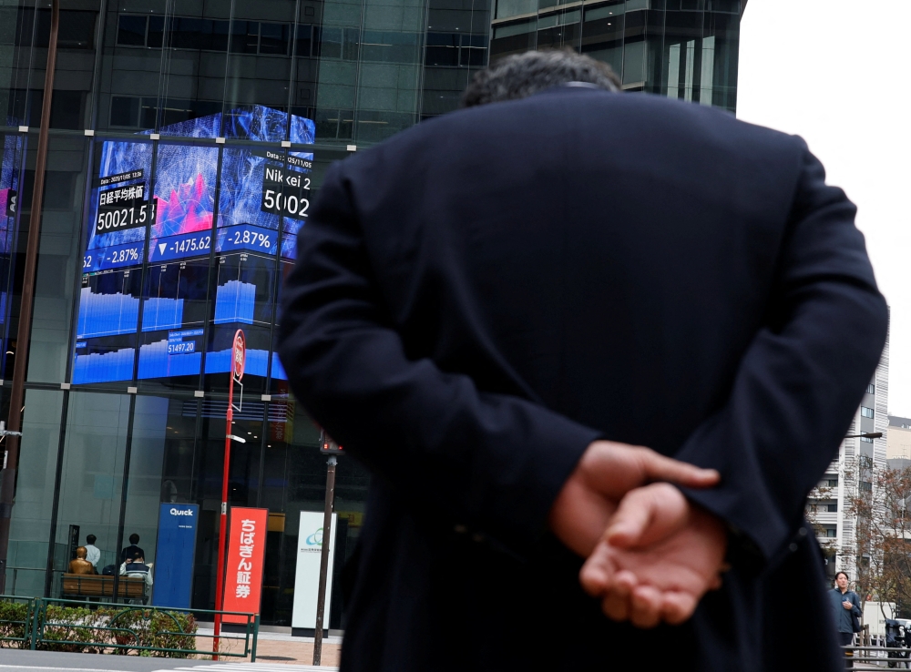 Asian markets opened higher as optimism grew that Washington could soon resolve its record-long government shutdown. — Reuters pic