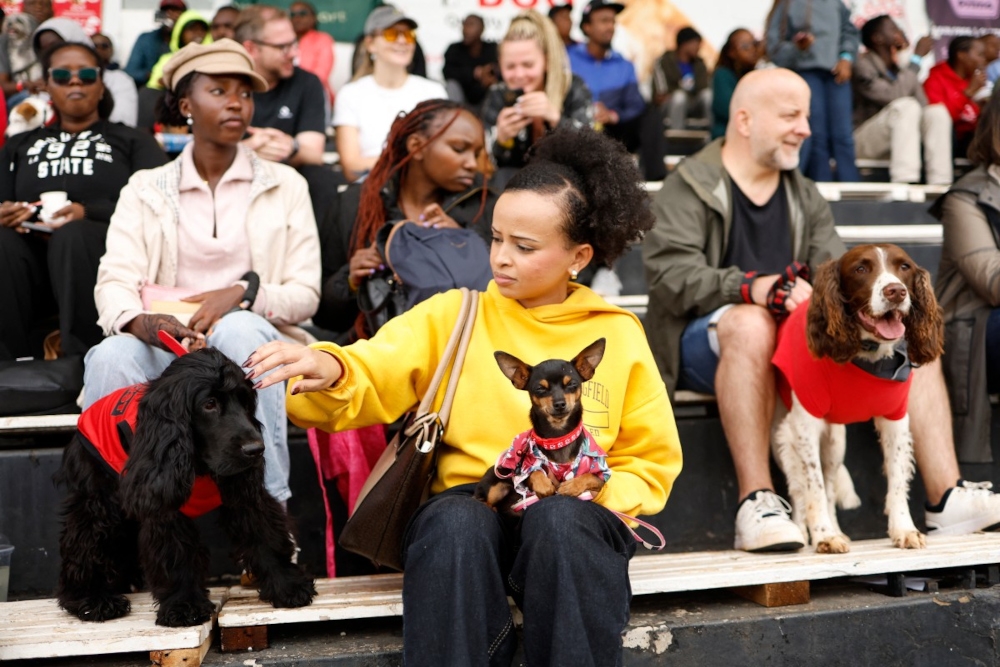 Fans and their pets participate in the 2025 Pawchella Shaggy Dog Show at Ngong Racecourse in Nairobi on November 9, 2025. — AFP pic 