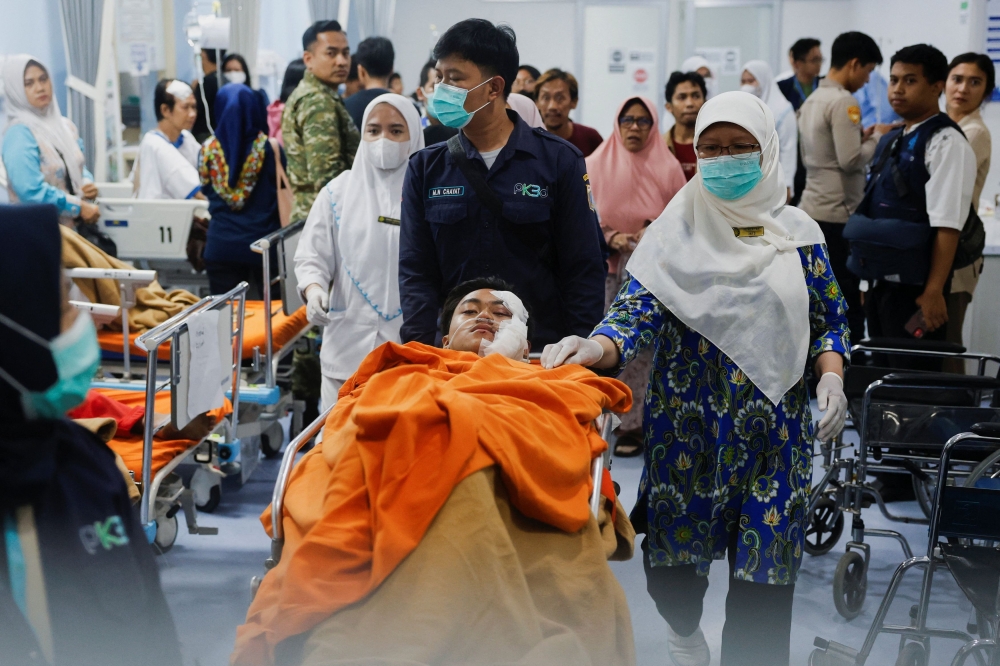 Teen suspect carried seven explosive devices in Jakarta school blasts, police say