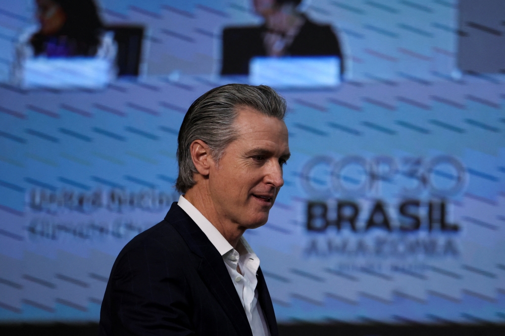 California Governor Gavin Newsom looks on, on the day he attends a press conference during the UN Climate Change Conference (COP30), in Belem, Brazil, November 11, 2025. — Reuters pic