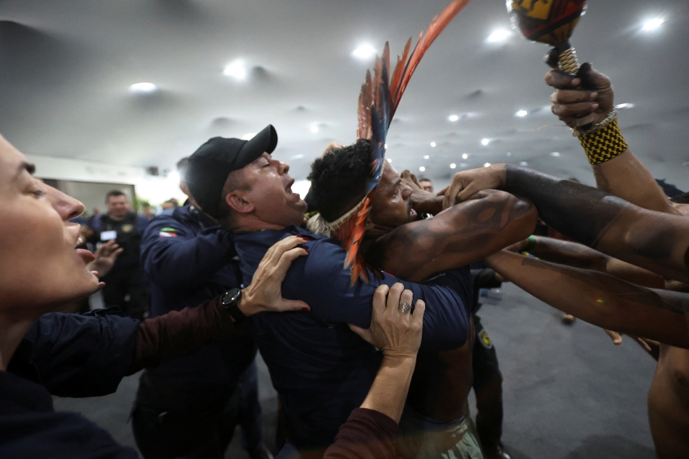 Protesters clash with security after forcing entry at COP30 in Brazil, UN reports minor injuries and damage