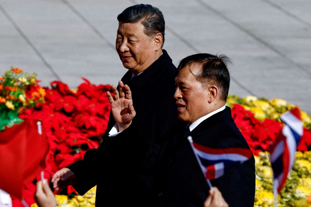 Thailand's King Maha Vajiralongkorn and Chinese President Xi Jinping attend a welcoming ceremony at the Great Hall of the People, in Beijing November 14, 2025.  — Tingshu Wang/Pool/Reuters pic 