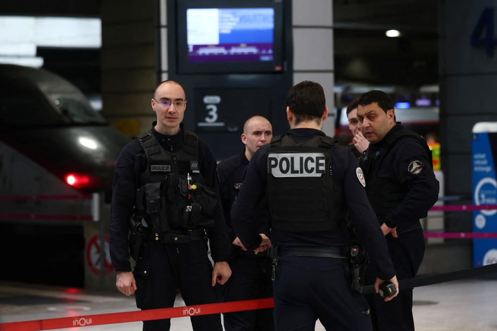 French police secure the area at the Gare Montparnasse train station during its evacuation in Paris November 14, 2025. — Reuters pic  