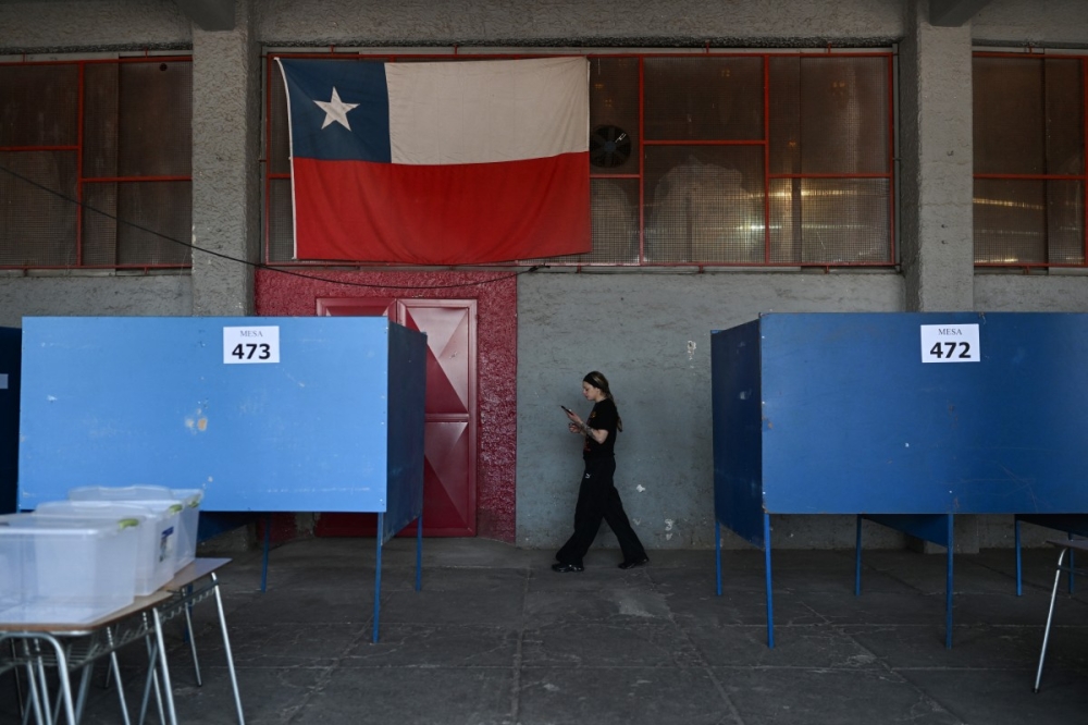 ‘Iron fist’ or welfare state? Chileans head to polls as far-right surges