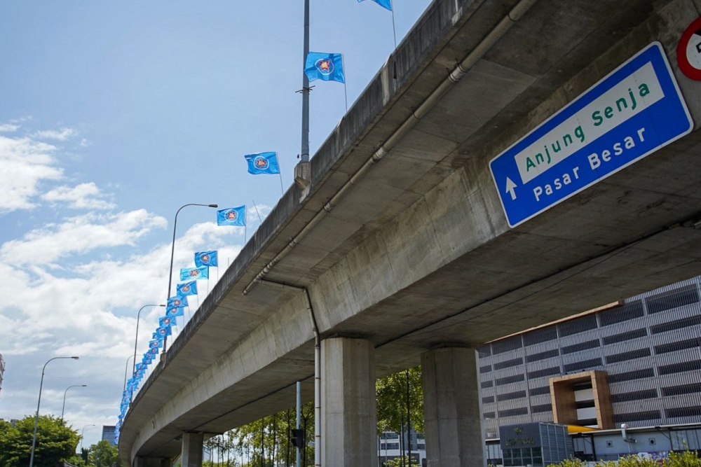 STARSabah flags along a flyover in Kota Kinabalu city centre. — The Borneo Post pic