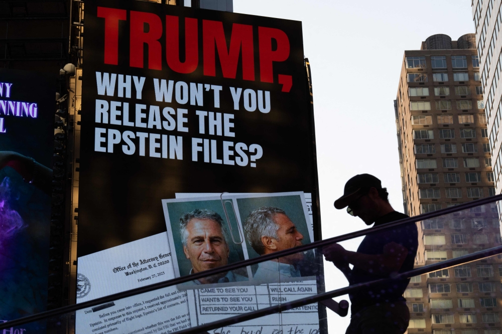 A billboard calls for the release of the Epstein files in Times Square, New York July 23, 2025. — AFP pic