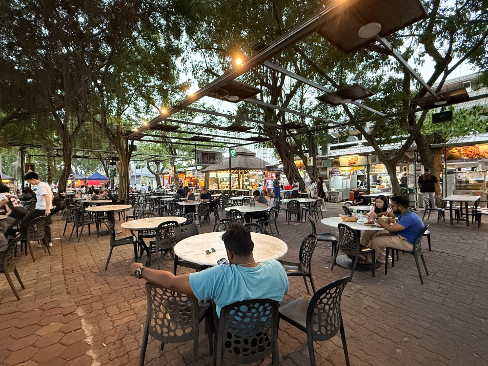 Rock Cafe offers an open-air experience after night falls at the vast food court. — Picture by Lee Khang Yi