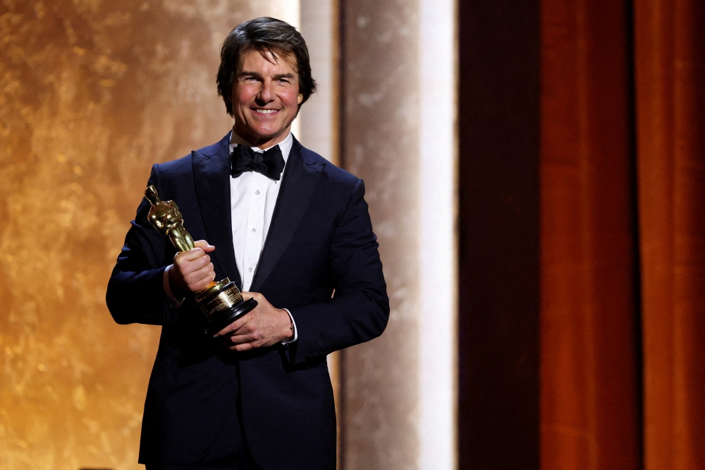 Tom Cruise poses with his honorary Oscar during the Academy of Motion Picture Arts and Sciences 16th Governors Awards in Los Angeles, California, US, on November 16, 2025. — Reuters pic