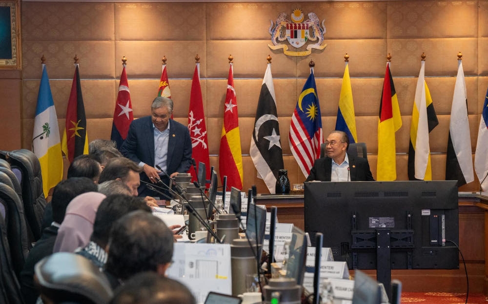 Deputy Prime Minister Datuk Seri Dr Ahmad Zahid Hamidi with Prime Minister Datuk Seri Anwar Ibrahim at the 82nd National Land Council (MTN) meeting in Kuala Lumpur, November 17, 2025. — Picture from Facebook/Zahid Hamidi