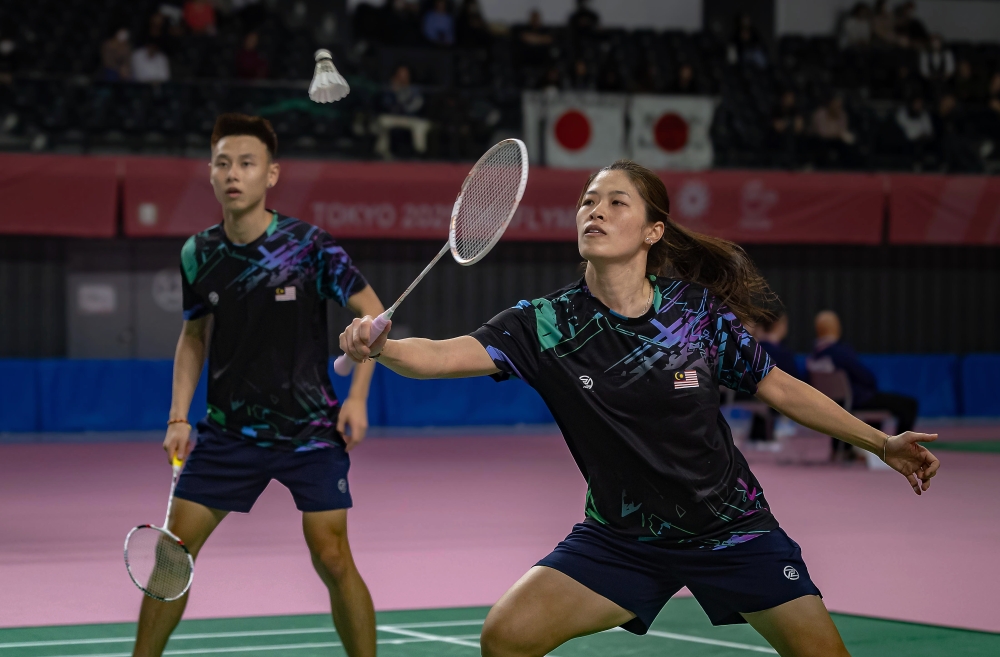 Mixed doubles pair Boon Wei Ying (right) and Edmund Teo compete at the Deaflympics 2025 in Keio Arena, Tokyo, on November 17, 2025. — Bernama pic