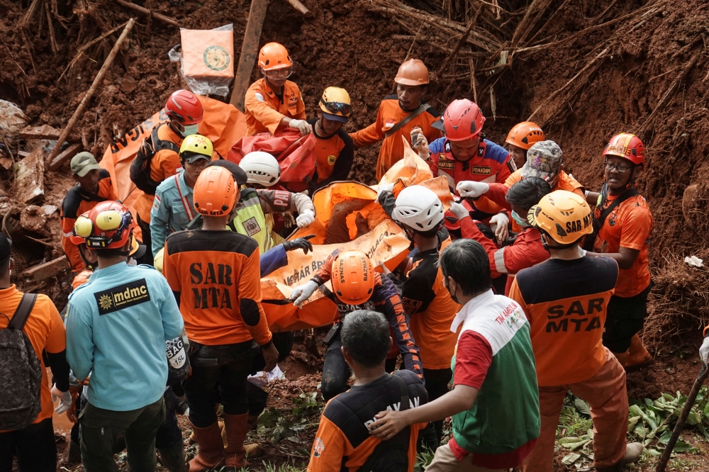 Indonesia landslides death toll rises to 18 with over 30 missing