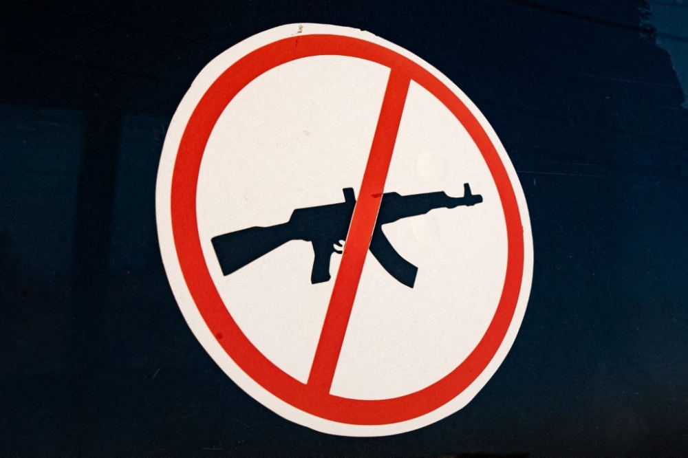 A ‘no weapons’ sticker is displayed on the window of a van at the 70 Kare IDP centre in Mekele, Ethiopia on April 9, 2025. — AFP pic