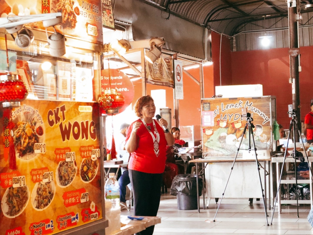 Jannie Lasimbang speaks to voters during her Kepayan campaign today. — Picture via Facebook/Jannie Lasimbang