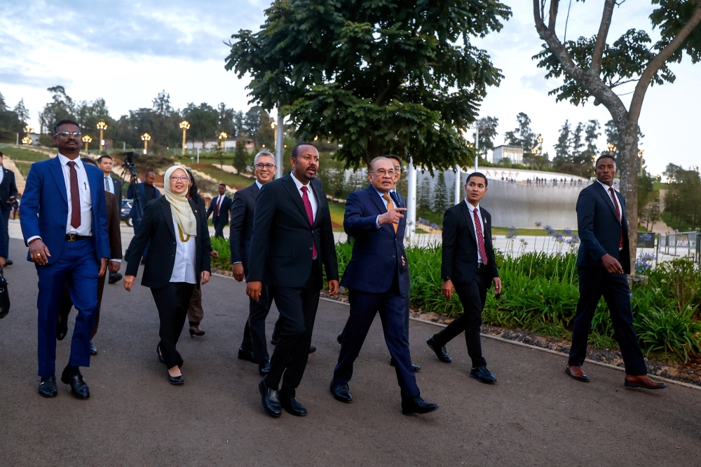Prime Minister Datuk Seri Anwar Ibrahim and Ethiopia’s Prime Minister Dr Abiy Ahmed Ali during a visit to Friendship Park here yesterday. Also present was Investment, Trade and Industry Minister Tengku Datuk Seri Zafrul Abdul Aziz. — Bernama