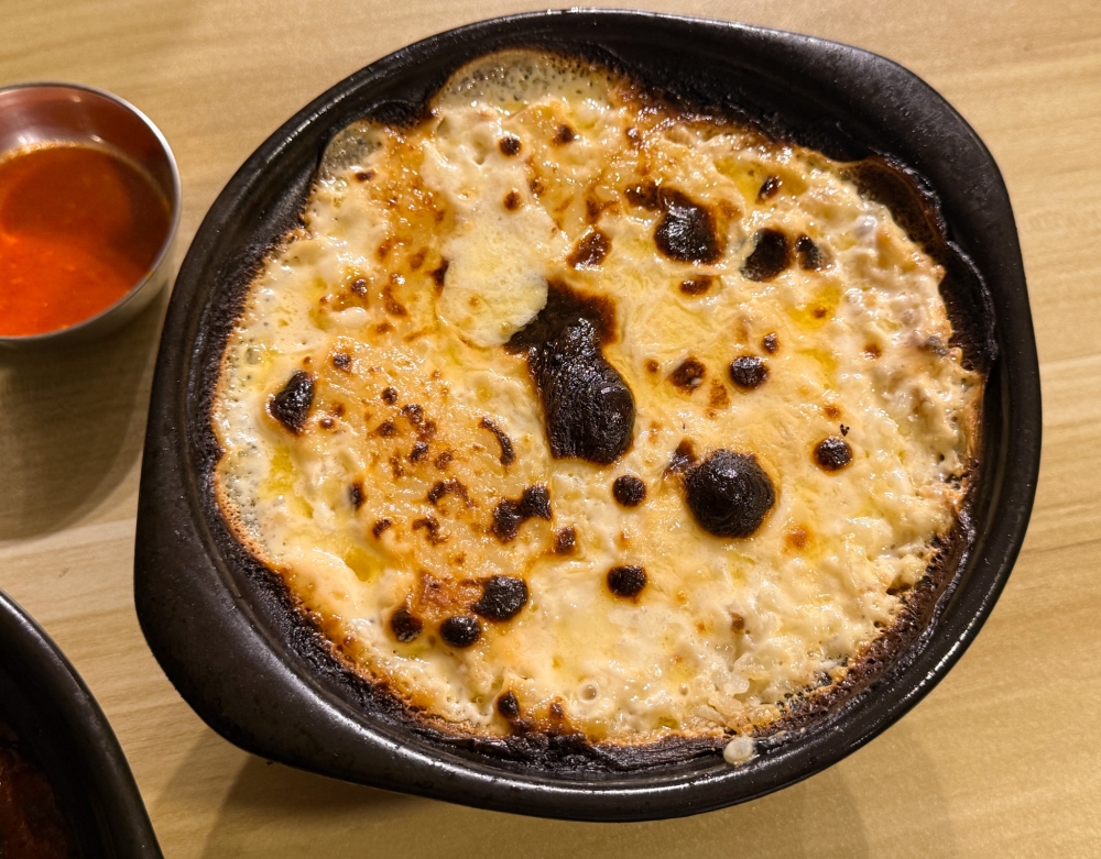 Nebu Signature Tagine is essentially a big hug of baked rice in milk and butter. — Picture by Lee Khang Yi