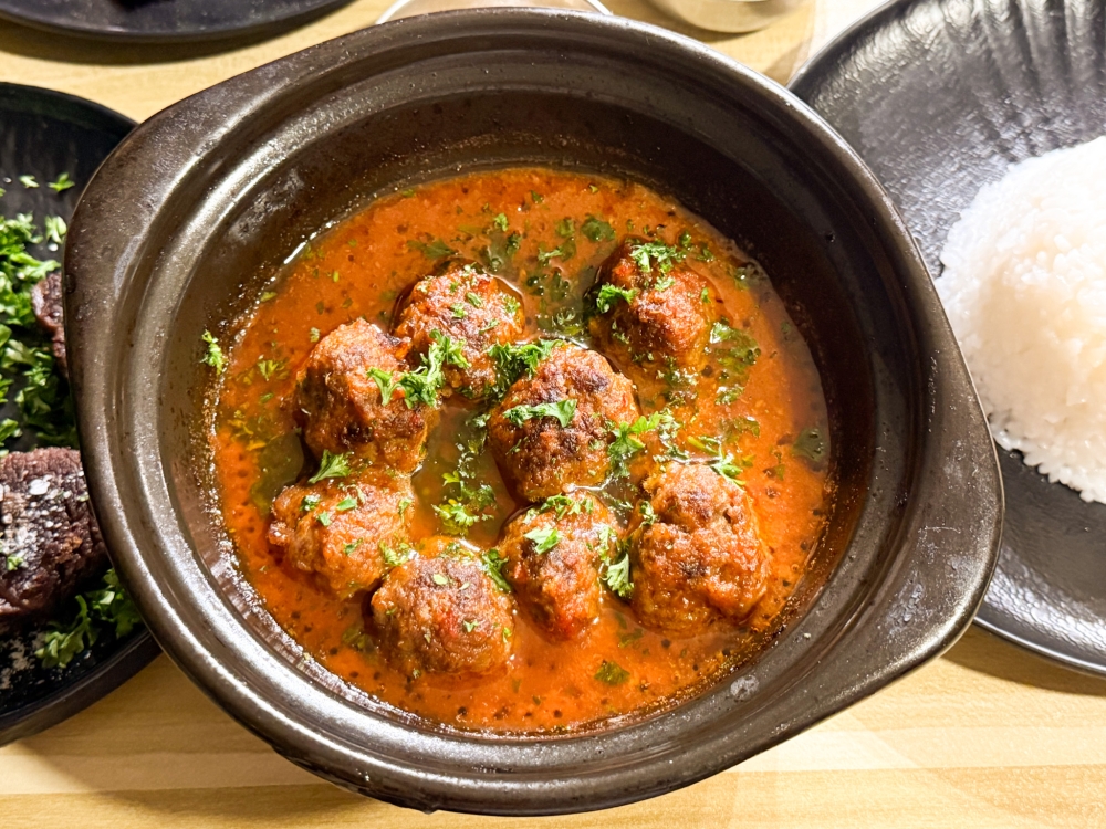 Kofta Dawood Pasha Tagine has beef meatballs cooked in a savoury tomato sauce. — Picture by Lee Khang Yi