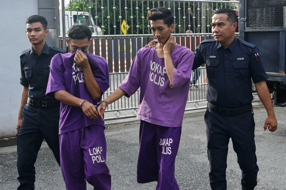 Muhamad Amirul Afiq Sanusi, 24, and Muhammad Khairul Aziman Shamsudin, 28, pleaded not guilty when the charges were read out to them separately before Magistrate Amin Rashidi Ramli. — Bernama pic 