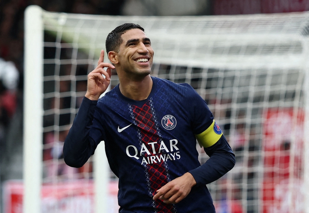 Achraf Hakimi celebrates scoring Paris Saint-Germain’s second goal during a Ligue 1 match in Brest, France, October 25, 2025. — Reuters pic