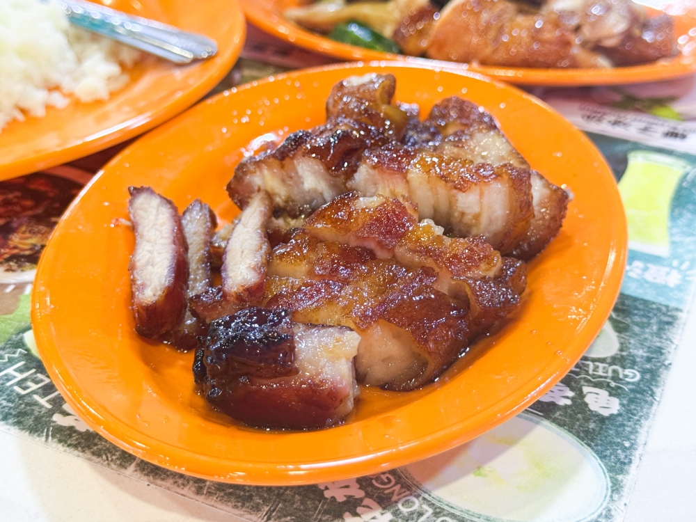 Char siu' with the rendered fat and tender meat enclosed within a wafer thin caramelised crust. 