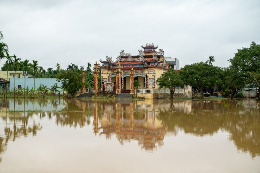 Flooding and inundation triggered by intense rainfall and rising river levels cause widespread destruction across Central and Southern Vietnam, as seen in Da Nang Province, Vietnam, November 20, 2025. — AFP pic