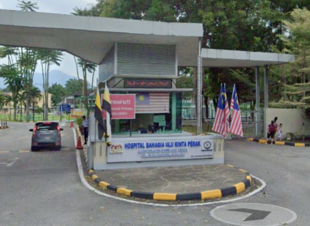 An undated photograph shows the entrance to Hospital Bahagia Ulu Kinta.