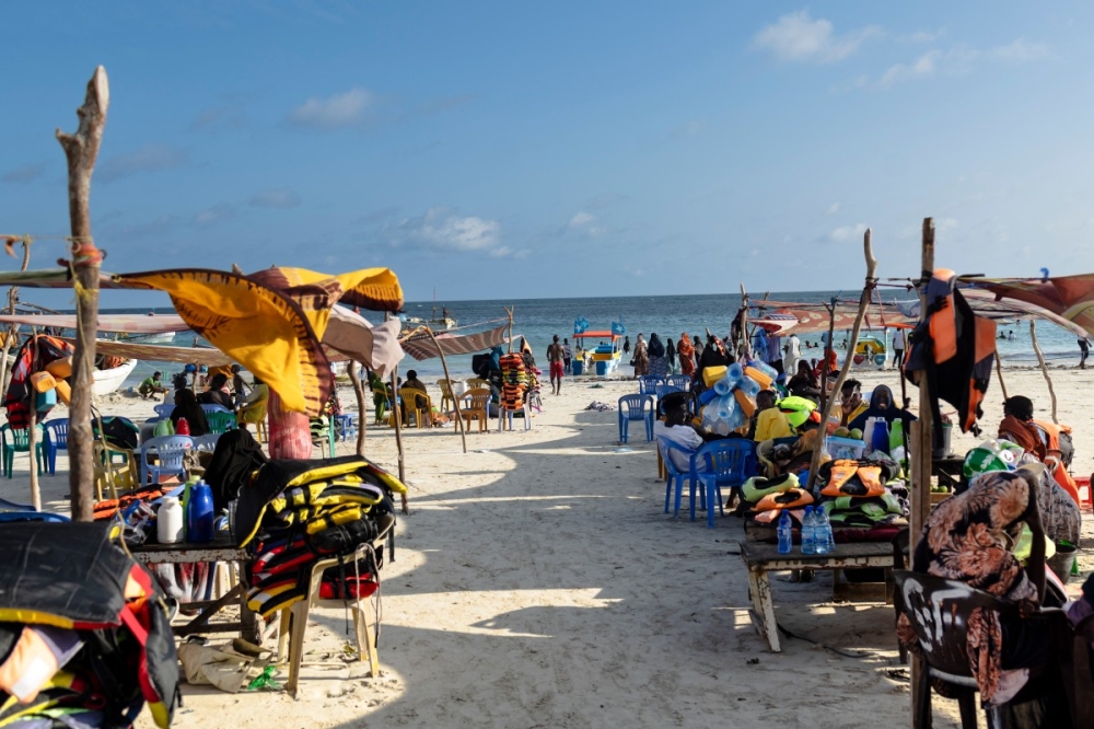 Vendors hawking food and flotation devices wait for visitors at Lido beach in Mogadishu on November 10, 2025. — AFP pic