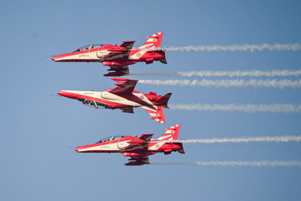 The Indian Air Force's Surya Kiran aerobatics team performs a display flight at Al-Maktoum International Airport during the Dubai Airshow 2025 in Dubai on November 20, 2025. — AFP