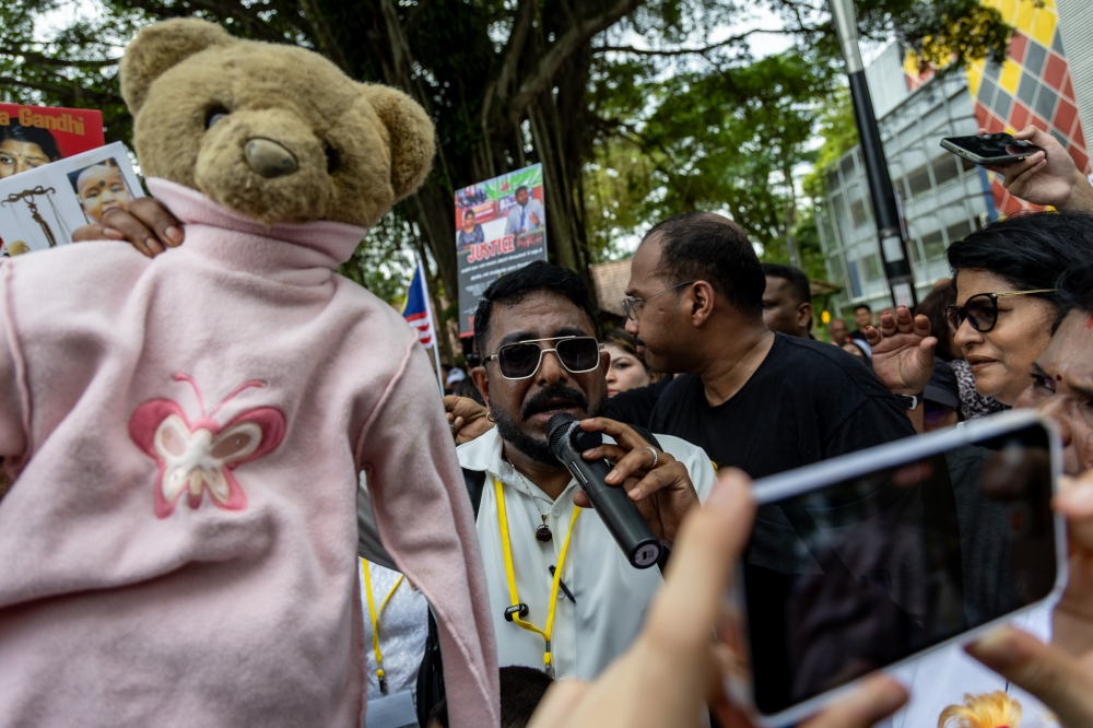 Social activist Arun Dorasamy speaks during the Indira Gandhi Justice March from Sogo Kuala Lumpur to Bukit Aman to deliver her daughter’s teddy bear in Kuala Lumpur November 22, 2025. — Picture by Firdaus Latif