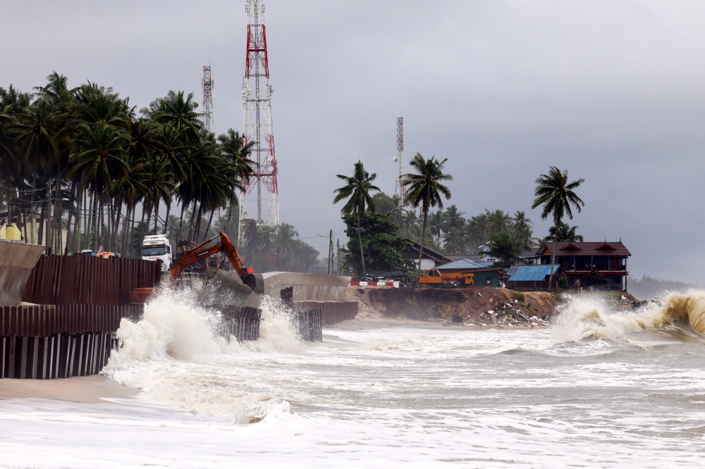 暴风雨的天空，气旋的可能性很低：马来西亚气象局警告说，强风和大雨将持续到周二