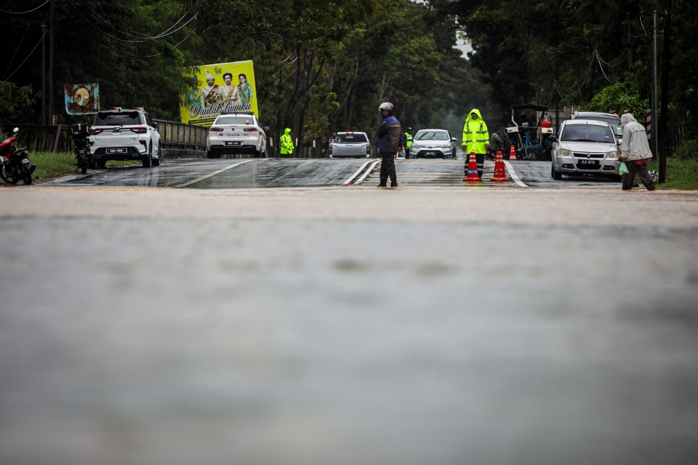 Rising waters force more families from their homes in Penang, Perak and Kedah