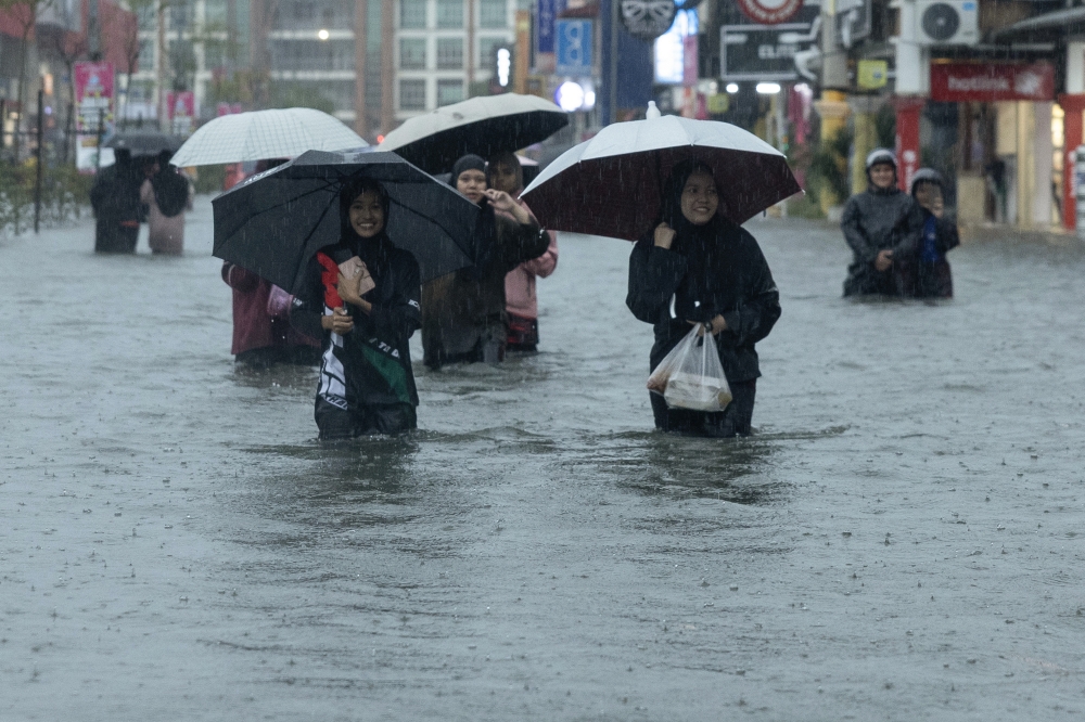 Taman Bendahara in Pengkalan Chepa is inundated following continuous heavy rain on November 22, 2025. — Bernama pic