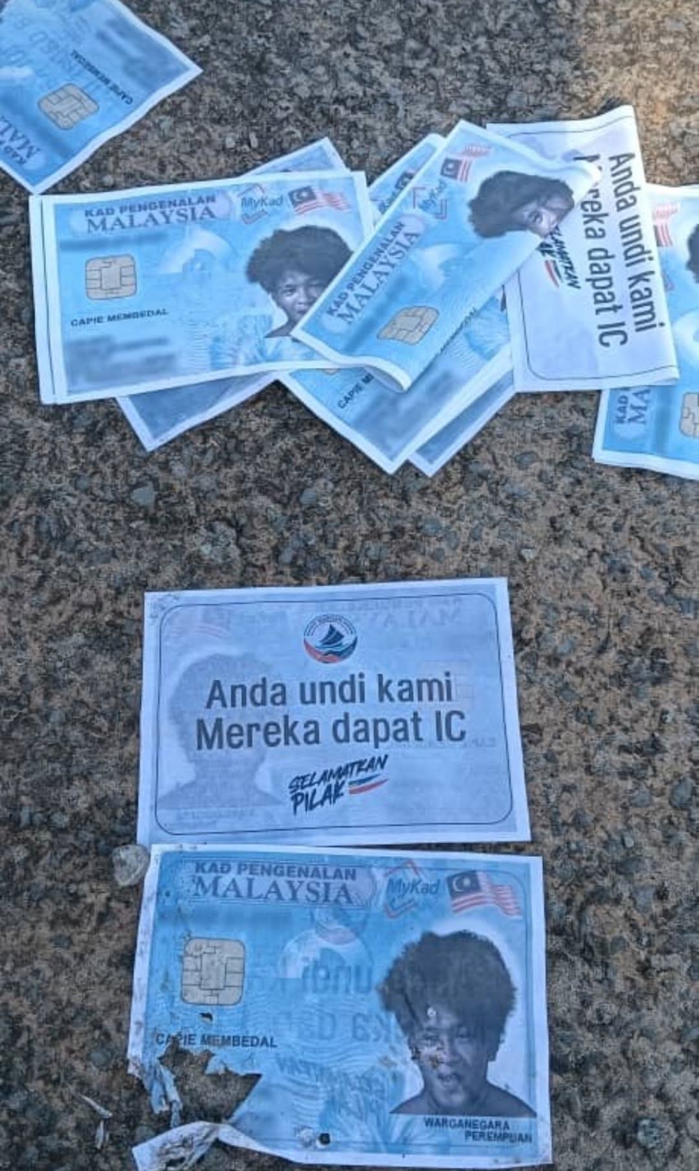 The pamphlets inferred that a vote for Warisan was giving MyKads or ICs to illegal immigrants.— Picture courtesy of Warisan The pamphlets inferred that a vote for Warisan was giving MyKads or ICs to illegal immigrants.— Picture courtesy of Warisan