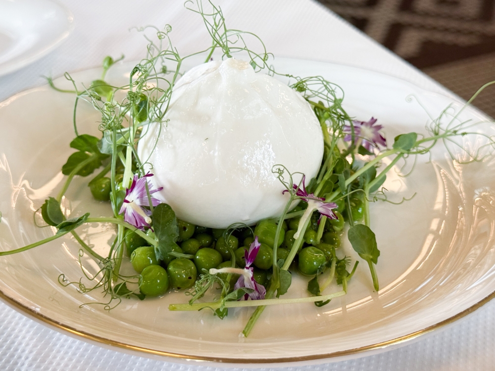 Puglian Burrata Garden Pea Salad is a mixture of creaminess from the burrata, sweetness from the peas and the nuttiness from the pesto. — Picture by Lee Khang Yi