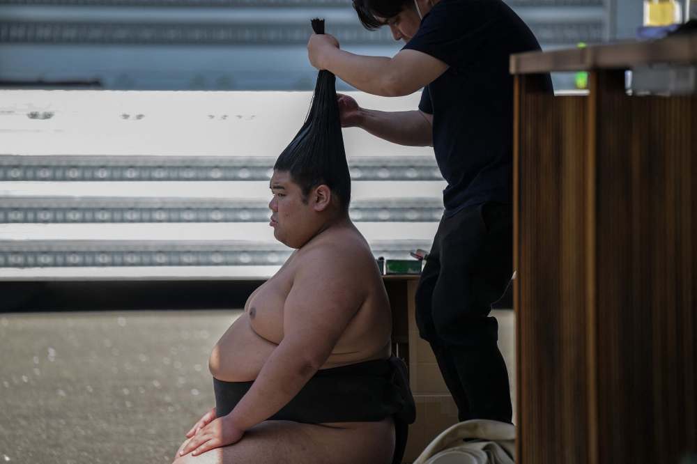 From topknots to hotpots: Five facts about the world of sumo wrestling