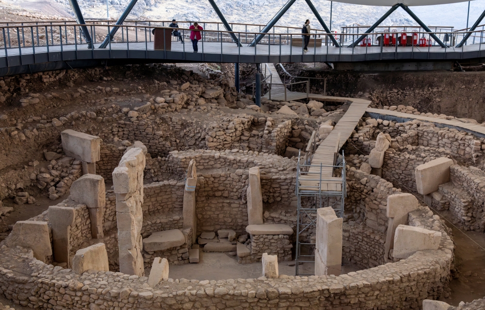 Tourists visit the Gobeklitepe excavation site, widely regarded with Karahantepe as keys to understanding the birth of symbolic thought, social complexity and monumental architecture thousands of years before cities or states existed, near the south-eastern city of Sanliurfa, Turkiye November 24, 2025. — Reuters pic