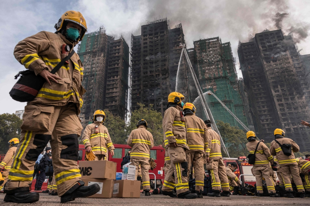 Hong Kong housing estate fire death toll rises to 55, authorities confirm