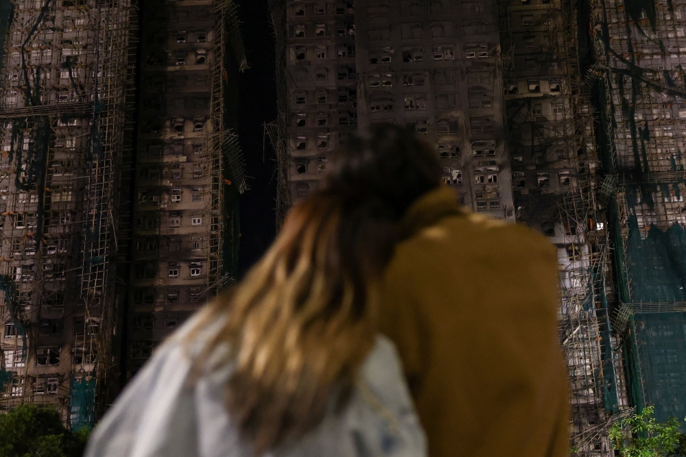 Hong Kong’s deadliest fire in decades kills at least 94, with scores still unaccounted for