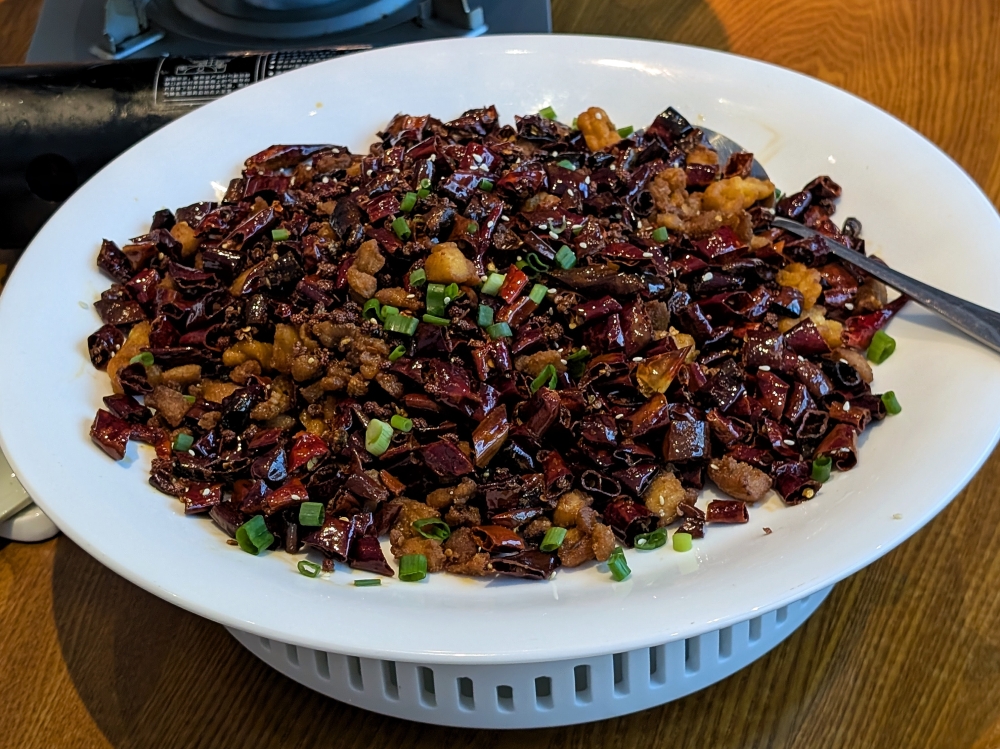 Another classic Sichuan dish from Chongqing, ‘la zi ji’, requires some work to sift through and find the bits of chicken. — Picture by Ethan Lau