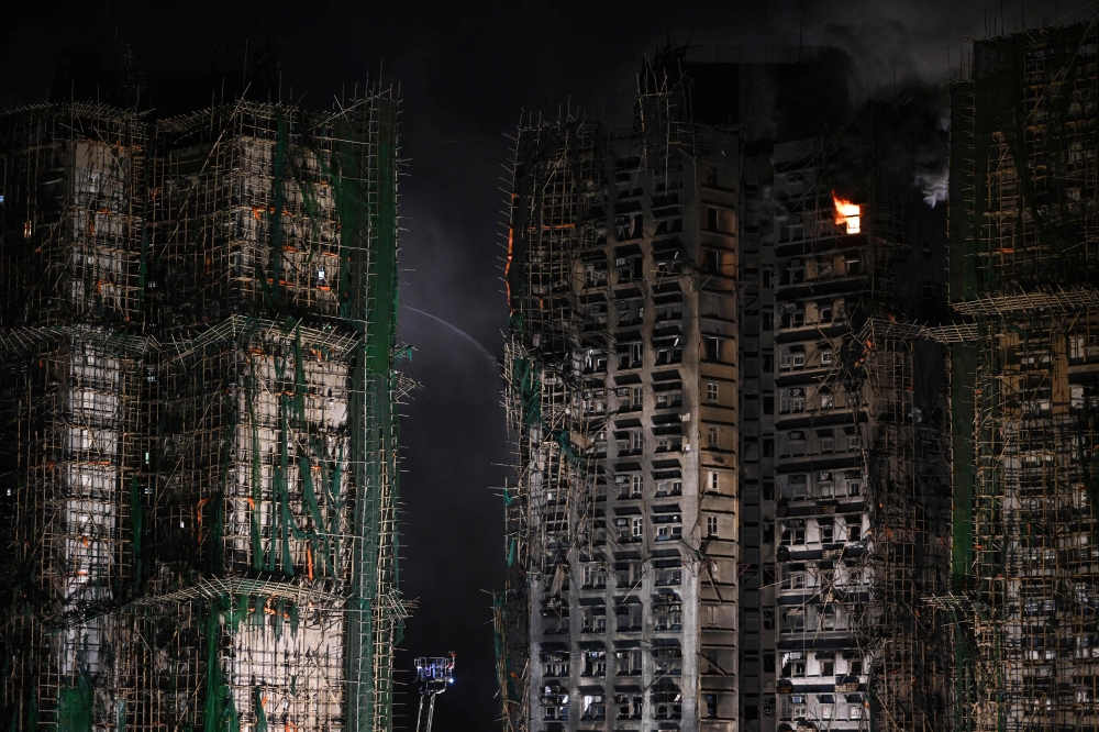 A general view shows the aftermath of a major fire that swept through several apartment blocks at the Wang Fuk Court residential estate in Hong Kong’s Tai Po district on November 27, 2025. Firefighting operations at Hong Kong’s deadliest blaze in decades have ended, a government spokesperson told AFP Friday, with the death toll at 94 and scores still missing. — AFP pic 