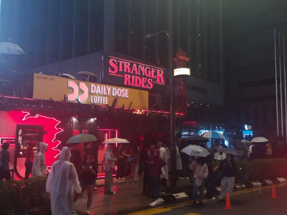 The entrance to ‘Stranger Rides’ at Daily Dose Coffee, Bangunan Getah Asli.  — Picture by Ian Jeremiah