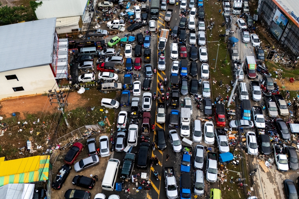 A drone view shows traffic blocked by cars parked on a road to escape floodwaters in Hat Yai district, Songkhla province, Thailand, on November 28, 2025. — Reuters pic