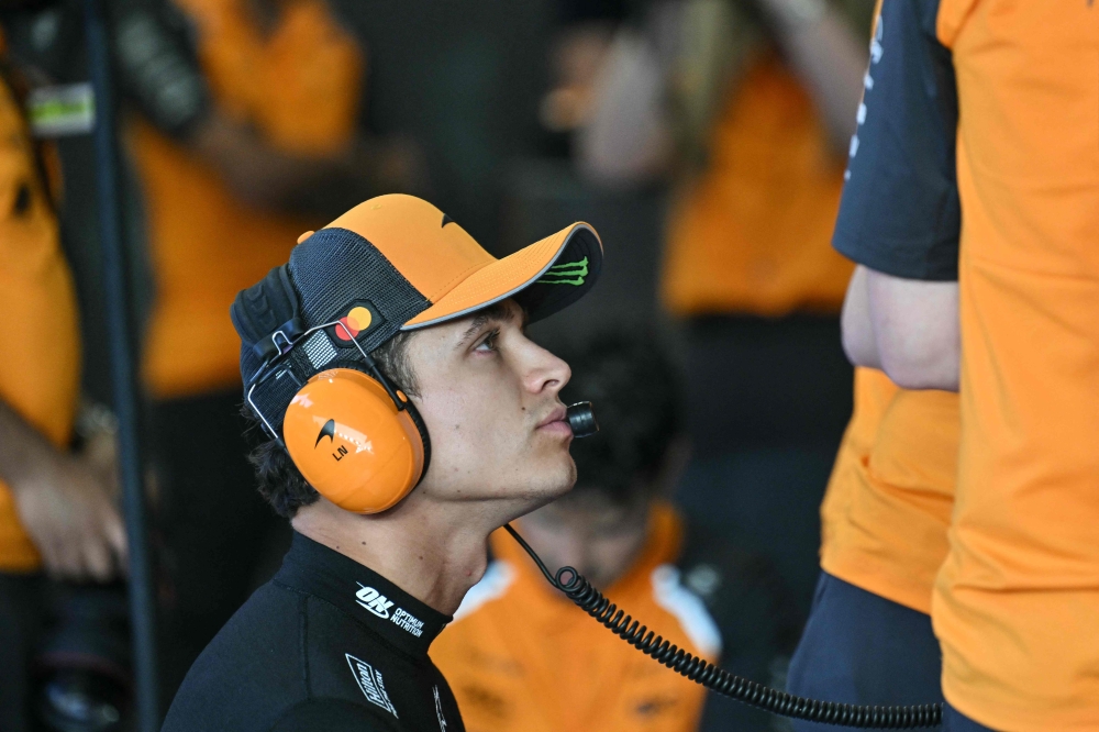 McLaren’s British driver Lando Norris looks on in the team garage before the sprint race ahead of the Formula One Qatar Grand Prix at the Lusail International Circuit in Lusail on November 29, 2025. — AFP pic