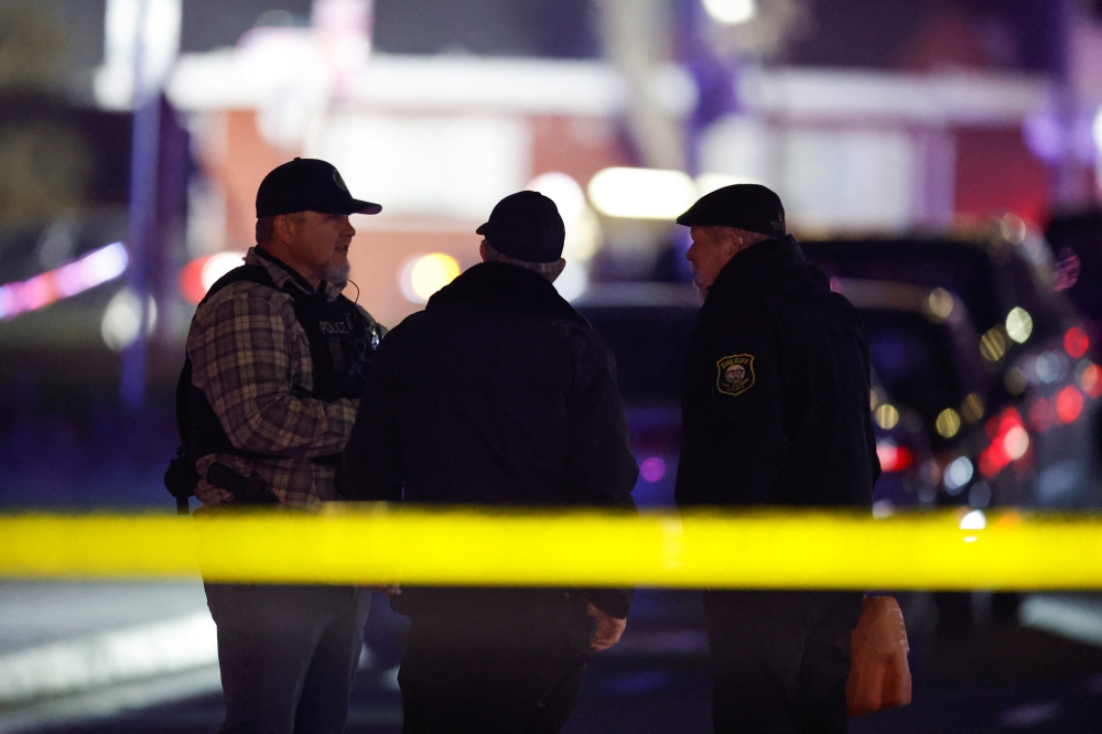 Members of the police work at the scene after several people were shot at a family gathering in Stockton, California, November 29, 2025. — Reuters pic