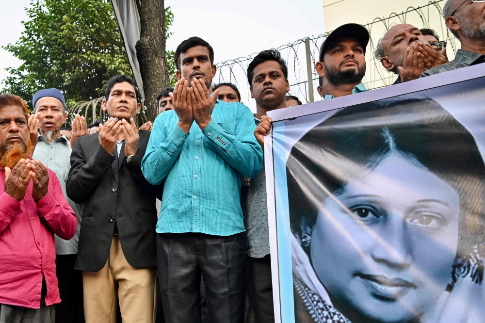 Bangladesh opposition leader Khaleda in critical condition, exiled son says his return not in his hands