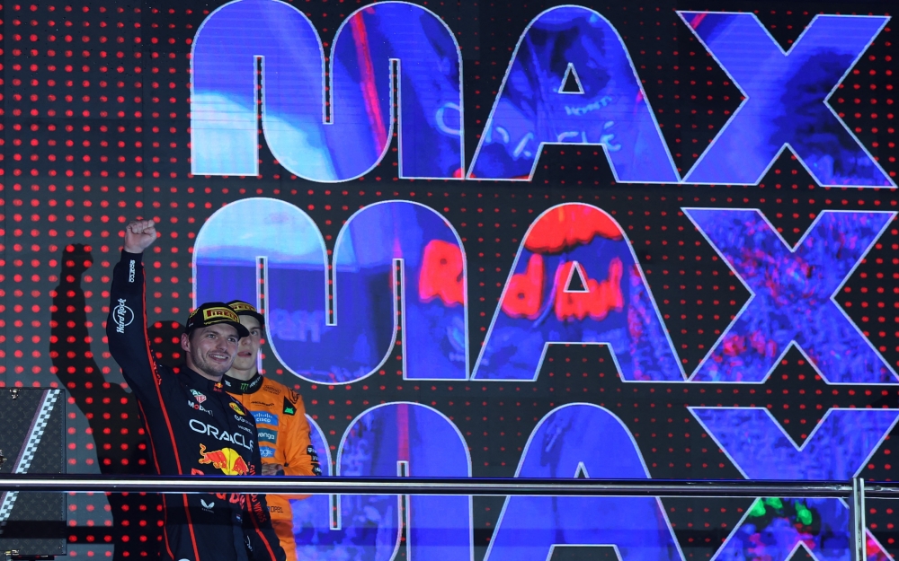 Red Bull’s Max Verstappen celebrates on the podium after winning the Formula One Qatar Grand Prix at the Lusail International Circuit, Lusail, Qatar, on November 30, 2025. — Reuters pic