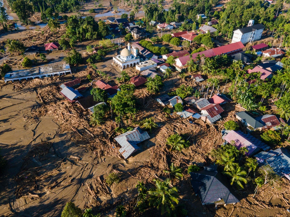 An aerial view shows flood damage in Meureudu, Pidie Jaya district in Indonesia’s Aceh province on November 30, 2025. — AFP pic 