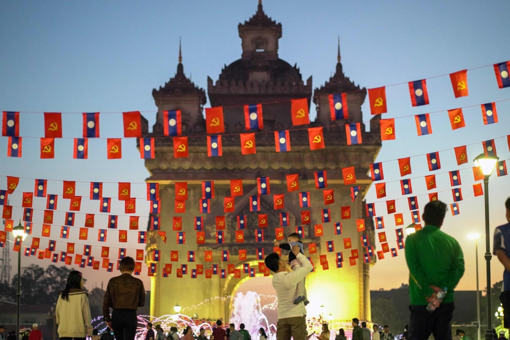 ‘Please don’t rush’: Laos celebrates 50 years while young generation eyes steady change