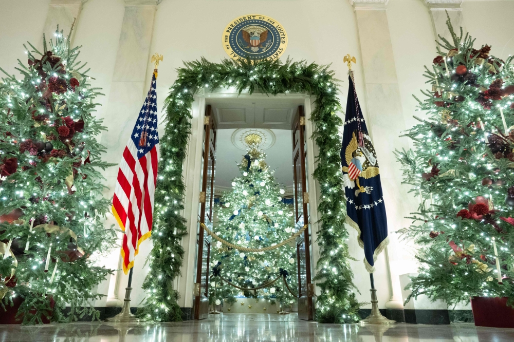 Christmas decorations are seen in the Grand Foyer of the White House in Washington. — AFP pic 
