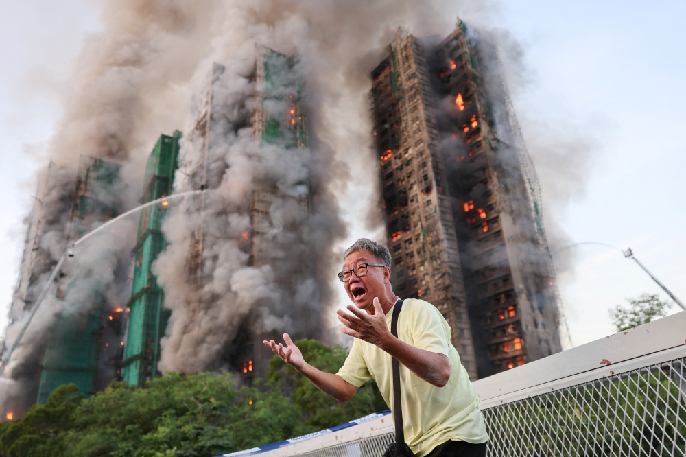 The photo that became a symbol for Hong Kong’s deadly fire