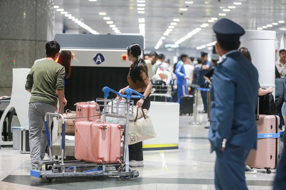 Flight passengers undergo customs checks as they arrive at the Kuala Lumpur International Airport, August 3, 2025 . — Picture by Sayuti Zainudin